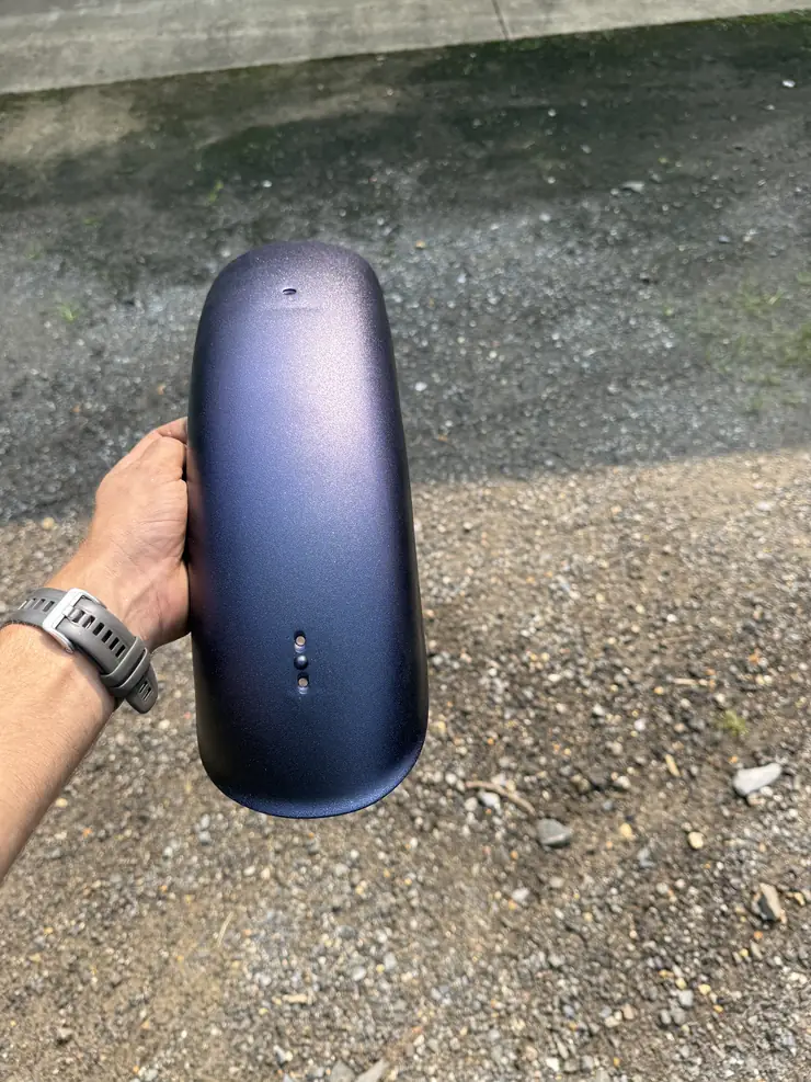 Motorcycle fender in metallic purple-blue
