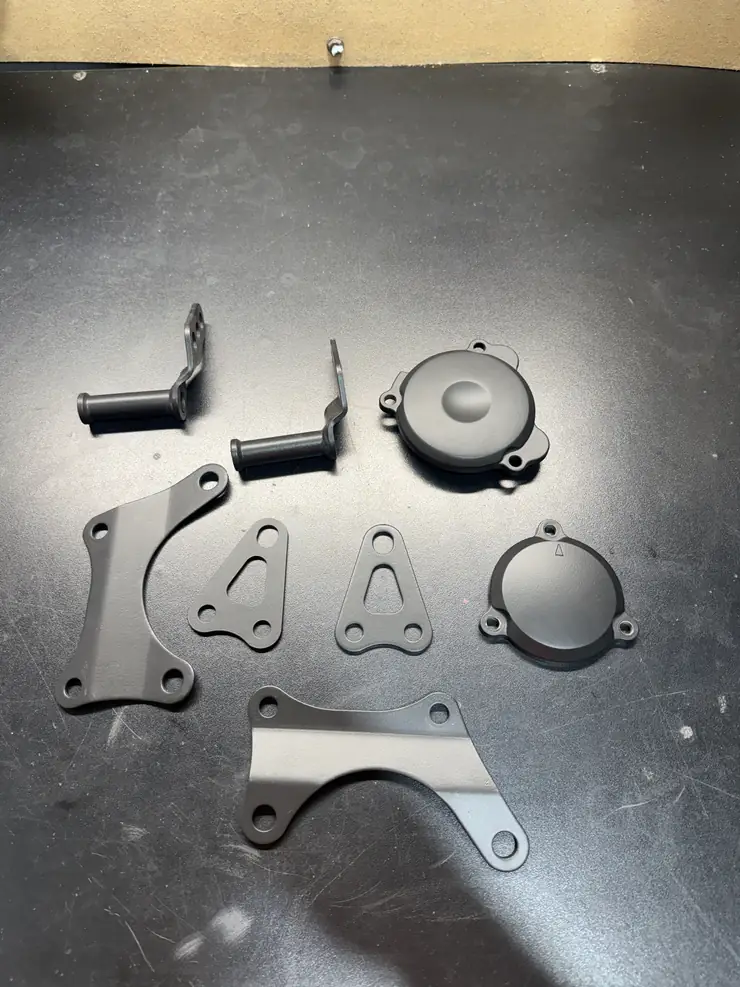 Engine covers and brackets in satin graphite